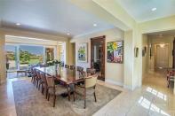 <p>The open-concept dining room boasts tiled floors. (Trulia) </p>