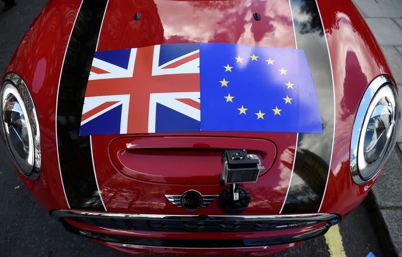 FILE PHOTO: A Mini car is seen with a Union flag and European Union flag design on its bonnet in London