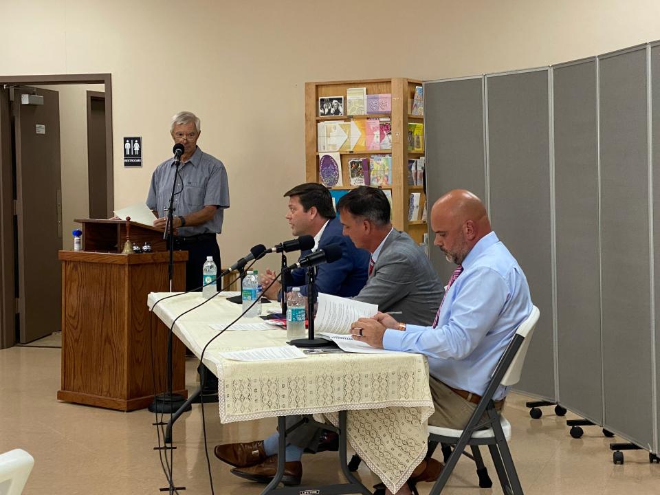 From left, Escambia County Commission District 2 candidates Kevin Brown, Michael Kohler and Chance Walsh participate in a Warrington Revitalization Committee forum on Tuesday.