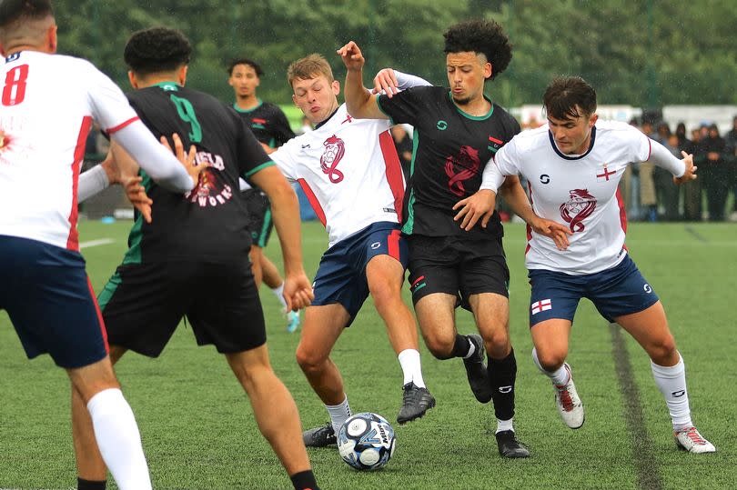 England and Libya lock horns as they compete for the ball in the WIOC finial of 2024 (Image: Glen O'Connell WIOC)