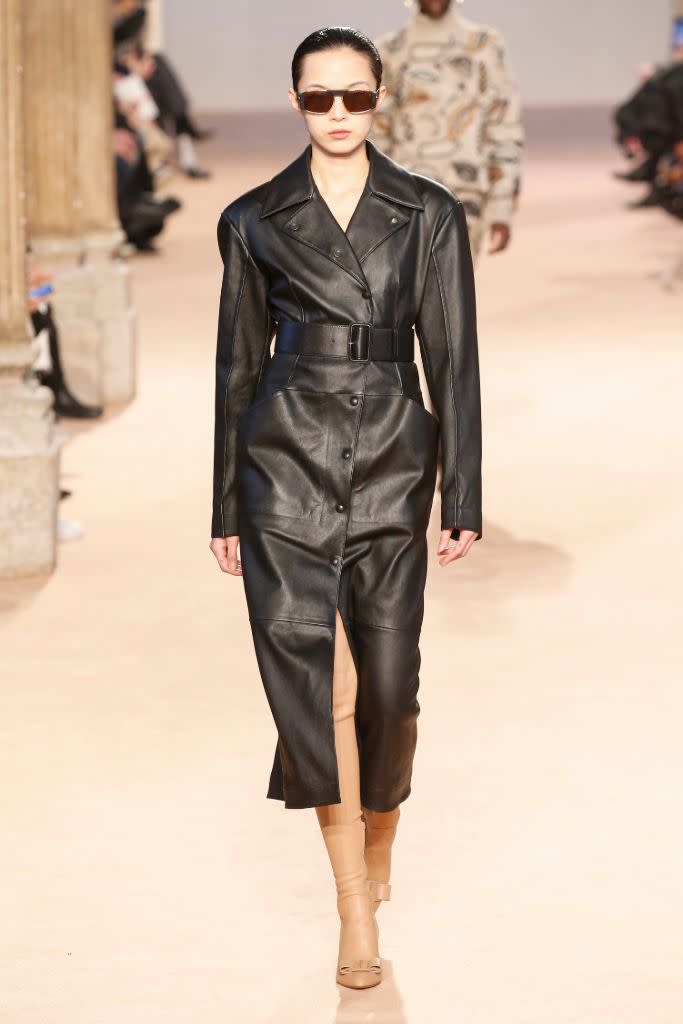 A leather trench and stretch leather boots at Ferragamo fall ’20. - Credit: Shutterstock