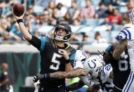 <p>Indianapolis Colts strong safety Matthias Farley (41) tackles Jacksonville Jaguars quarterback Blake Bortles (5) during the first quarter at EverBank Field. Mandatory Credit: Reinhold Matay-USA TODAY Sports </p>