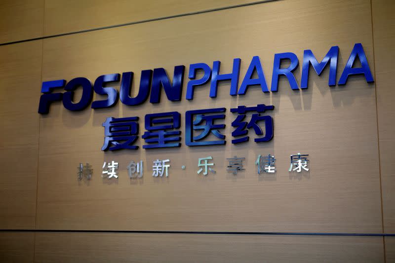 FILE PHOTO: A company logo is pictured at the headquarters of Shanghai Fosun Pharma Group in Shanghai