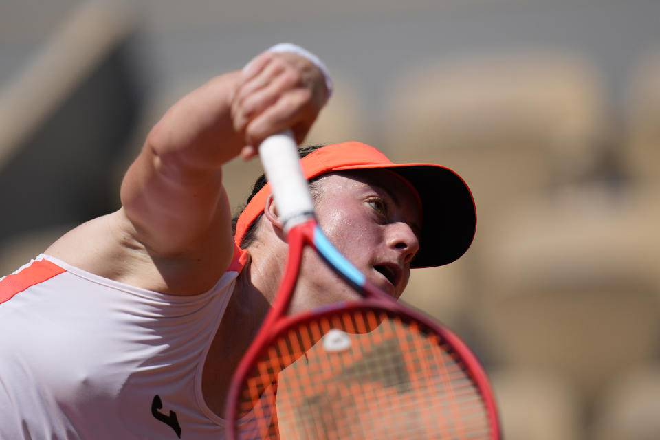 Slovenia's Tamara Zidansek serves to Spain's Paula Badosa during their quarterfinal match of the French Open tennis tournament at the Roland Garros stadium Tuesday, June 8, 2021 in Paris. (AP Photo/Christophe Ena)