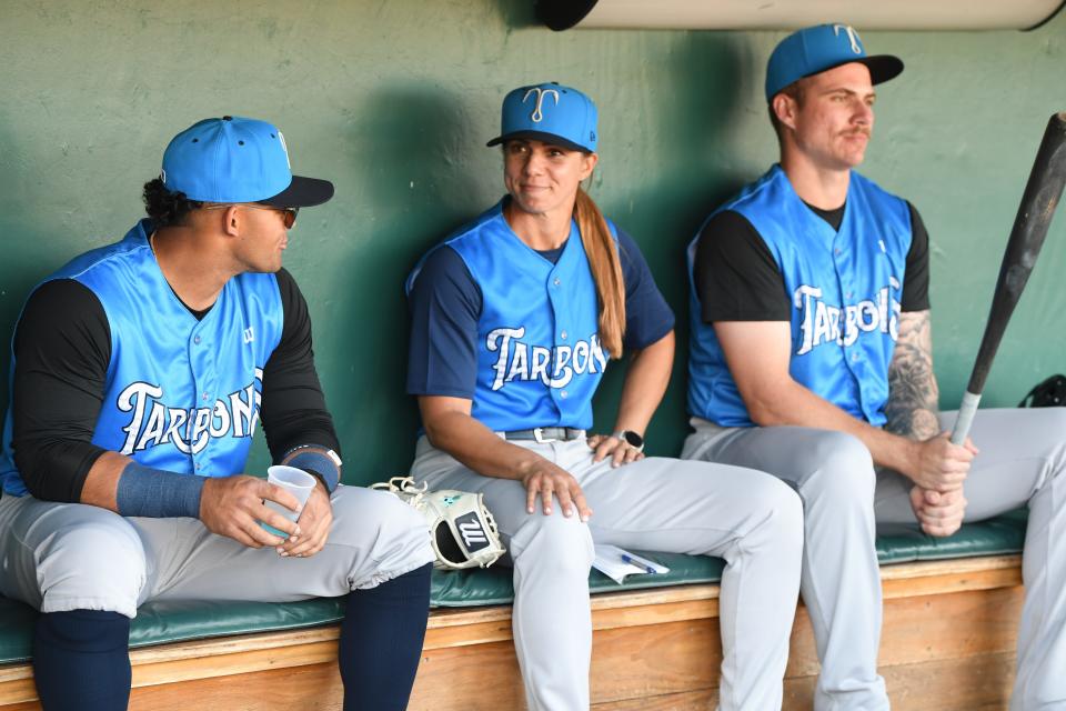 Rachel Balkovec, center, is enthused about the game of baseball. She managed Friday in her first game as the Tarpons' skipper.