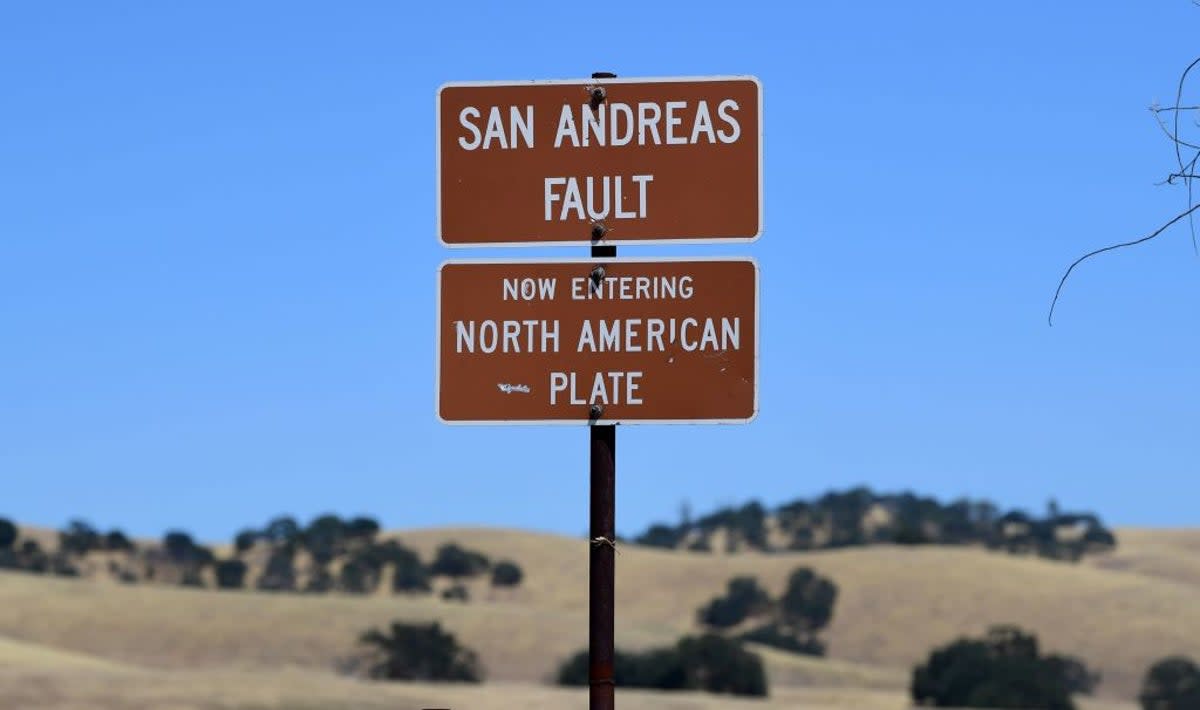 The San Andreas Fault is a tectonic boundary between the Pacific Plate, which is moving to the northwest at three inches each year and the North American Plate, heading south at about one inch per year. (AFP via Getty Images)