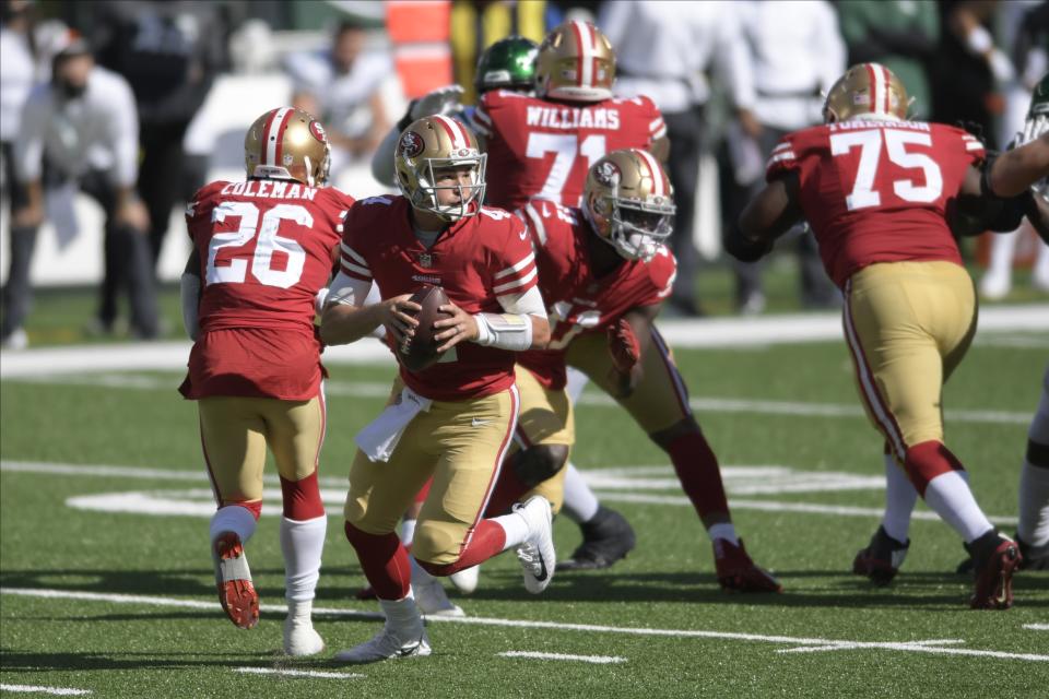 San Francisco 49ers quarterback Nick Mullens (4) looks to pass during the second half of an NFL football game against the New York Jets Sunday, Sept. 20, 2020, in East Rutherford, N.J. (AP Photo/Bill Kostroun)