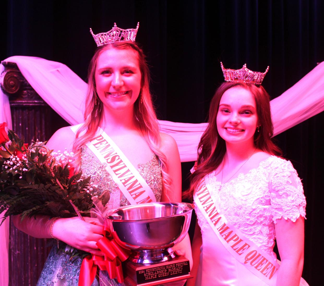 Incoming Queen Maple LXXVII Gracie Paulman stands by outgoing Queen Maple LXXVI Laura Boyce after the competition on Saturday evening.