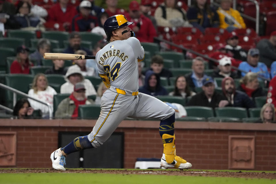 Milwaukee Brewers' William Contreras follows through on an RBI single during the 10th inning of a baseball game against the St. Louis Cardinals Friday, April 19, 2024, in St. Louis. (AP Photo/Jeff Roberson)