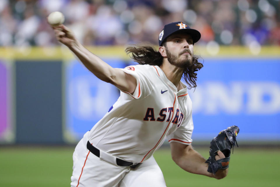 Houston Astros starting pitcher Spencer Arrighetti throws against the Atlanta Braves during the first inning of a baseball game Monday, April 15, 2024, in Houston. (AP Photo/Michael Wyke)