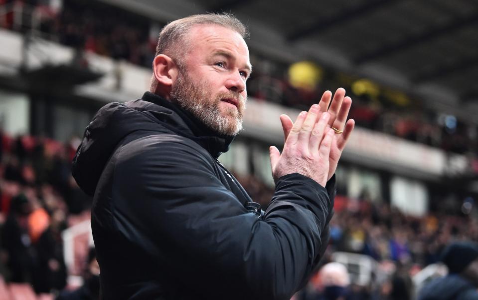 Wayne Rooney applauds the fans - GETTY IMAGES