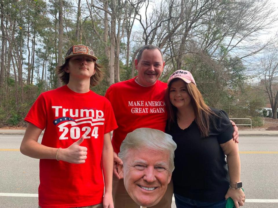 Scotty (center) and Brigitte attended former President Donald Trump’s Saturday, Feb. 10, rally in Conway, with their son.