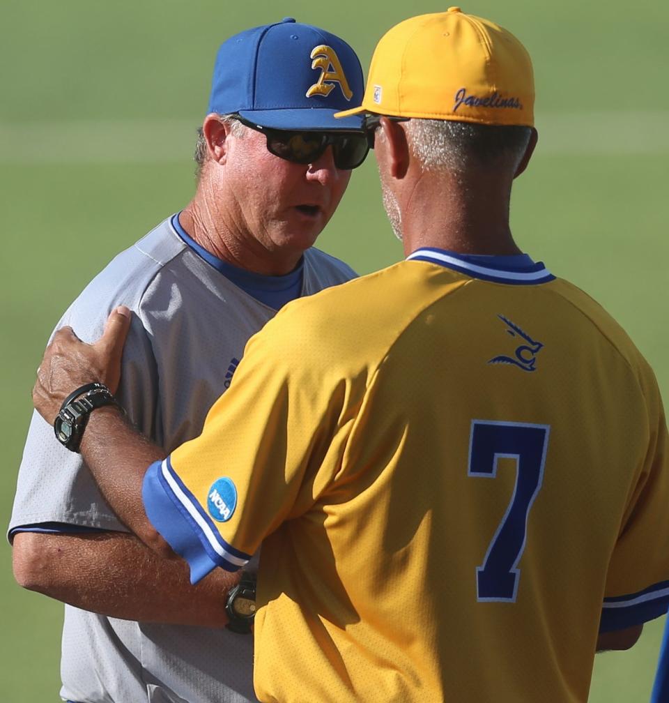 Angelo State University head baseball coach Kevin Brooks, left, and Texas A&M-Kingsville head coach Jason Gonzales shake hands after the final game of the South Central Regional Section I Tournament at Foster Field at 1st Community Credit Union Stadium on Saturday, May 21, 2022.