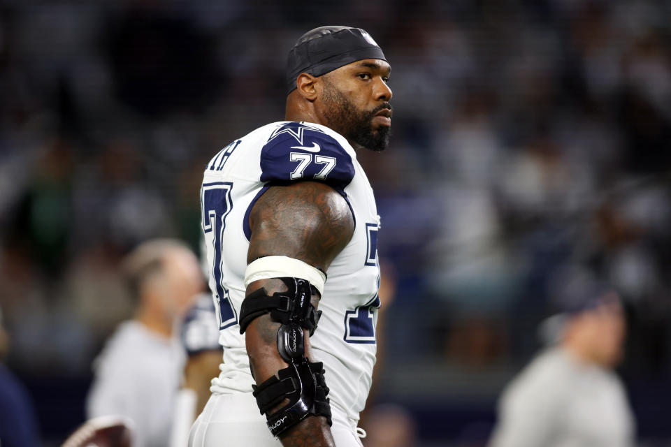 Dec 10, 2023; Arlington, Texas, USA; Dallas Cowboys offensive tackle Tyron Smith (77) on the field before the game against the Philadelphia Eagles at AT&T Stadium. Mandatory Credit: Tim Heitman-USA TODAY Sports