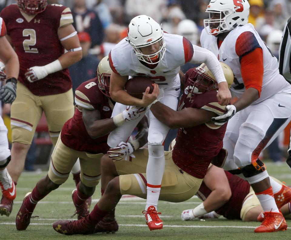 Syracuse QB Eric Dungey threw for 434 yards and three touchdowns in the win over Boston College. (AP Photo/Mary Schwalm)
