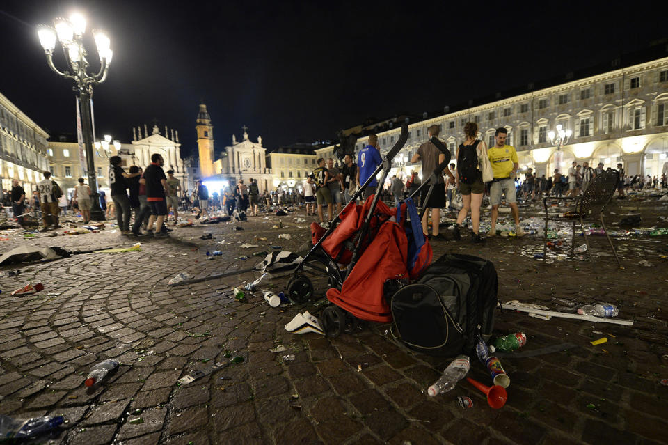 <p>A stroller is abandoned at Piazza San Carlo after a panic movement in the fanzone where thousands of Juventus fans were watching the UEFA Champions League Final football match between Juventus and Real Madrid on a giant screen, on June 3, 2017 in Turin. (Massimo Pinca/AFP/Getty Images) </p>