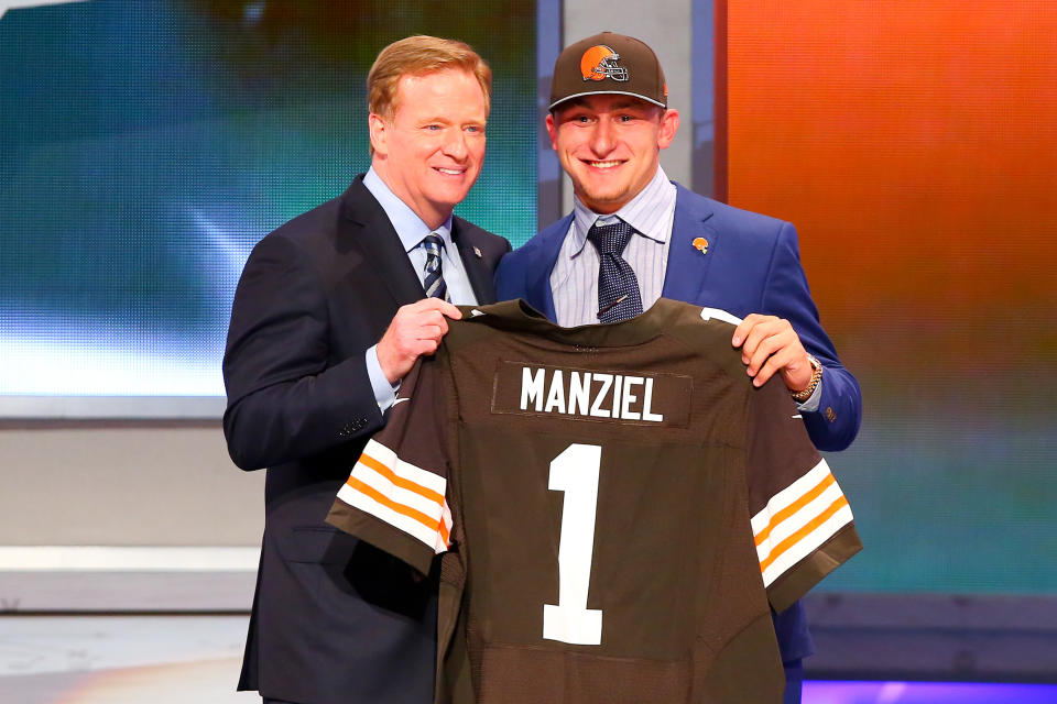 NFL commissioner Roger Goodell with Johnny Manziel after the Cleveland Browns selected Manziel with the 22nd overall pick of the 2014 NFL draft. (Photo by Rich Graessle/Icon SMI/Corbis/Icon Sportswire via Getty Images)