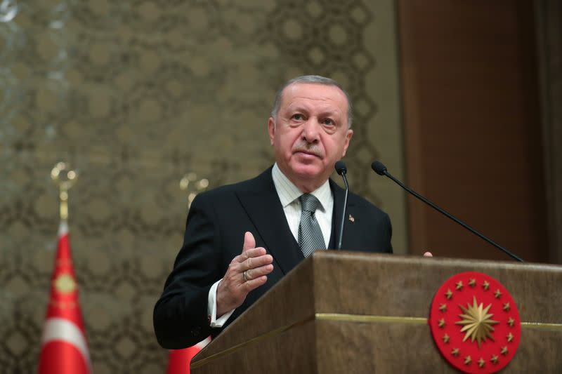 Turkish President Erdogan speaks during a symposium in Ankara