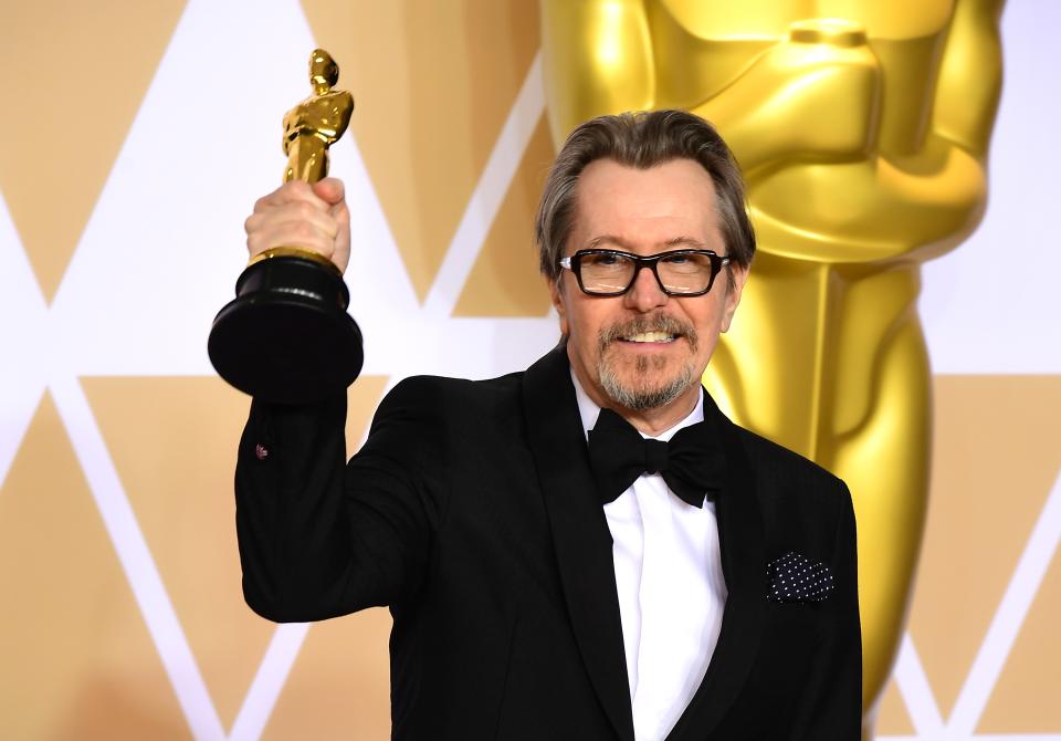 Gary Oldman with his Best Actor Oscar for Darkest Hour. (PA)