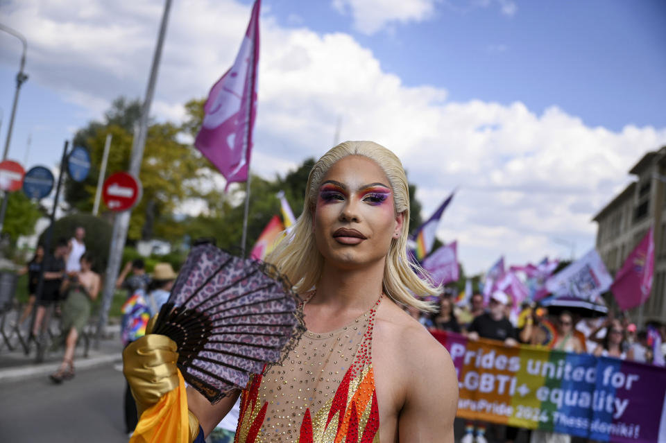 A reveller takes part in EuroPride, a pan-European international LGBTI event featuring a Pride parade which is hosted in a different European city each year, in the northern port city of Thessaloniki, Greece, Saturday, June 29, 2024. (AP Photo/Giannis Papanikos)