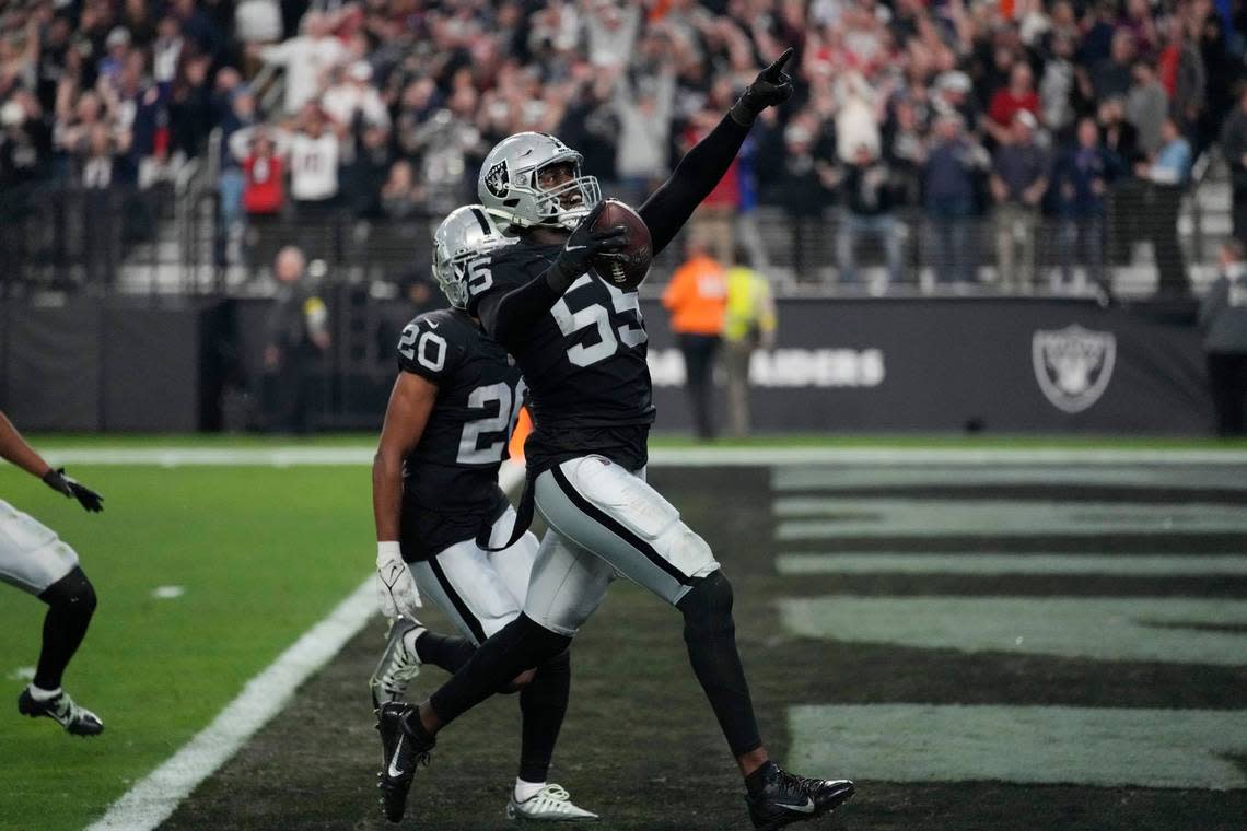 Las Vegas Raiders defensive end Chandler Jones celebrates after scoring on an interception during the second half of an NFL game, Sunday, Dec. 18, 2022, in Las Vegas.