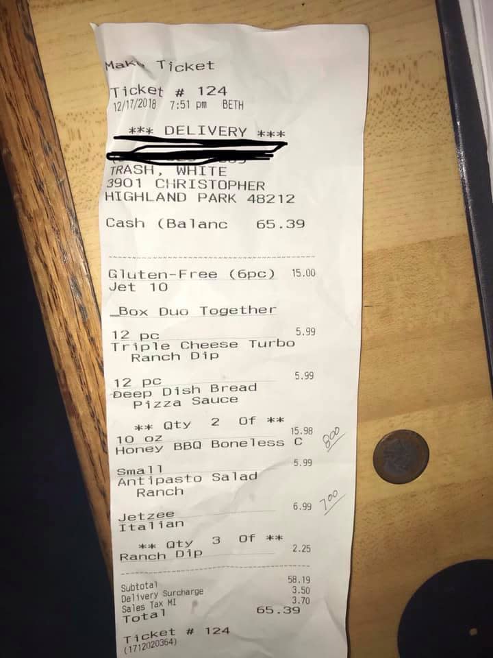 Michigan customer Jason Charboneau received a bill from Jet’s Pizza that read “Trash, White.” (Photo: Facebook/Jason Charboneau)