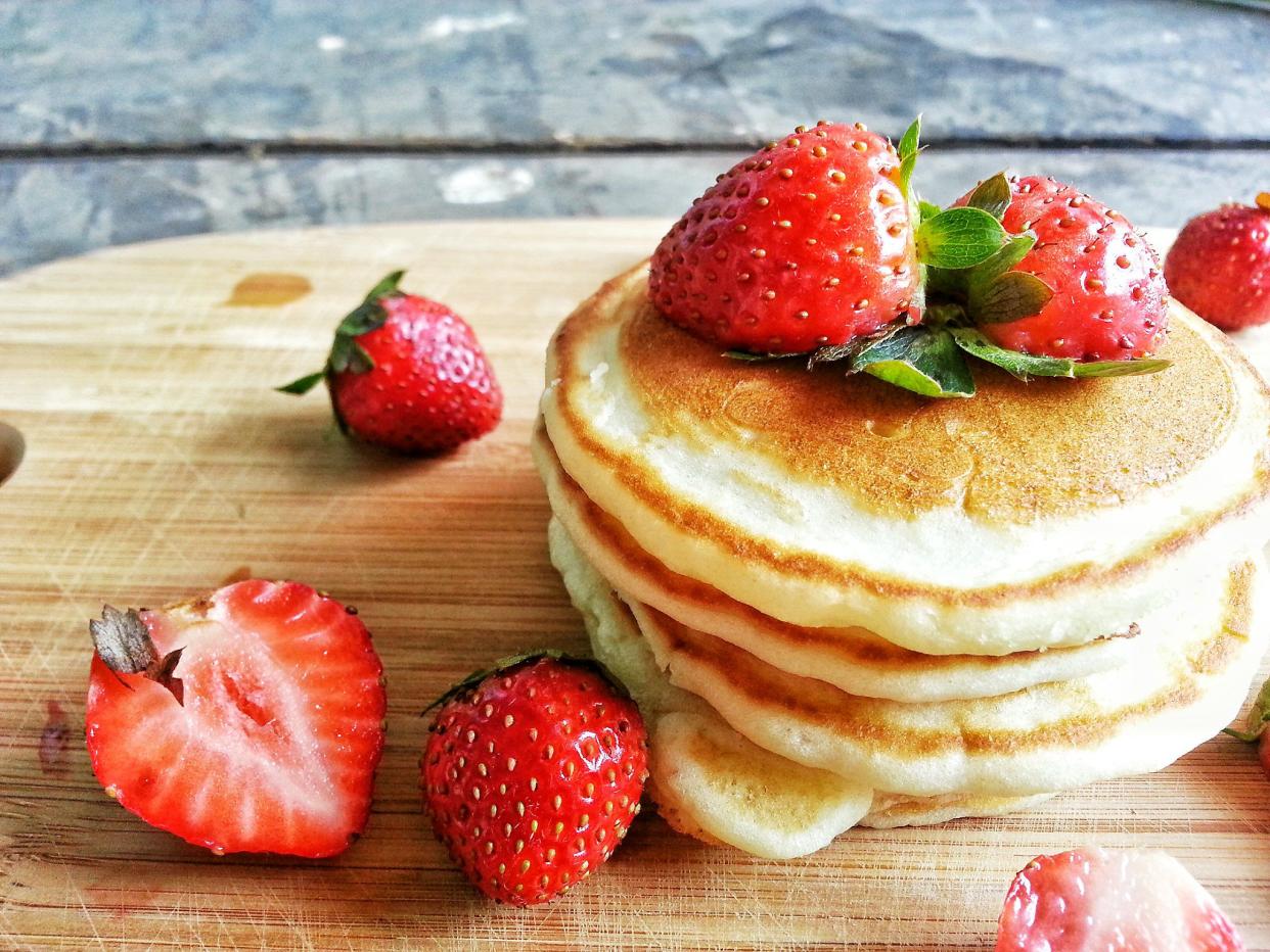 a stack of strawberry pancakes