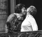 FILE - In this April 30, 1980 file photo, Princess Juliana, just after her abdication, kisses her eldest daughter Queen Beatrix, left, on the balcony of the Royal Palace in Amsterdam, Netherlands. The Dutch Queen Beatrix announces she is to abdicate in favor of Crown Prince Willem Alexander during a nationally televised speech Monday, Jan. 28, 2013. Beatrix, who turns 75 on Thursday, has ruled the nation of 16 million for more than 32 years and would be succeeded by her eldest son, Crown Prince Willem-Alexander. (AP Photo/ Ferry van Groen, File)