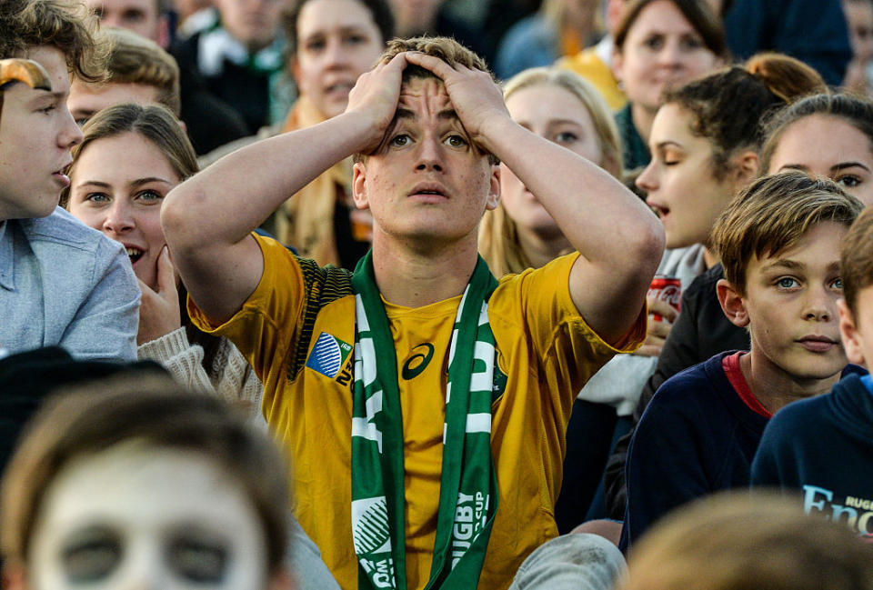 Australian fans look worried during the Rugby World Cup Final match between the New Zealand All Blacks and Australia Wallabies at Richmond Park Fan Zone on October 31, 2015 in London, United Kingdom.