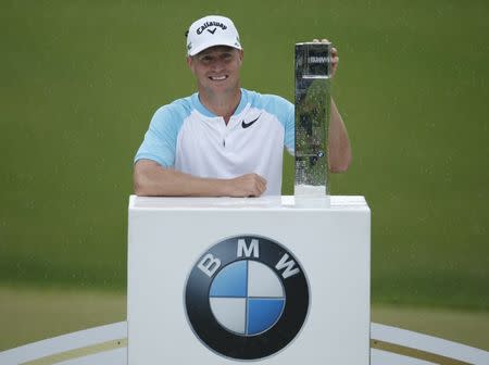 Britain Golf - BMW PGA Championship - Wentworth Club, Virginia Water, Surrey, England - 28/5/17 Sweden's Alex Noren celebrates winning the BMW PGA Championship with the trophy Action Images via Reuters / Paul Childs Livepic
