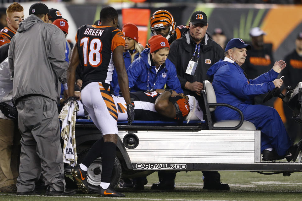 Bengals linebacker Vontaze Burfict (55) was carted off the field Monday after receiving a vicious block from Steelers rookie JuJu Smith-Schuster. (AP) 