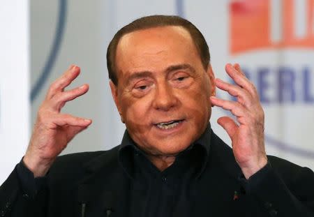 Former Italian prime minister Silvio Berlusconi gestures as he makes his speech during a presentation of Rome's mayoral candidate Alfio Marchini (not seen) in Rome, Italy May 10, 2016 REUTERS/Alessandro Bianchi