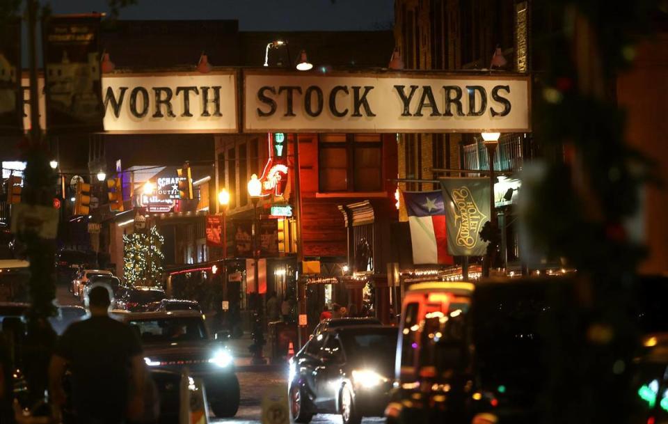 Visitors flood East Exchange Avenue near Mule Alley in the Fort Worth Stock Yards on Friday, December 10, 2021.