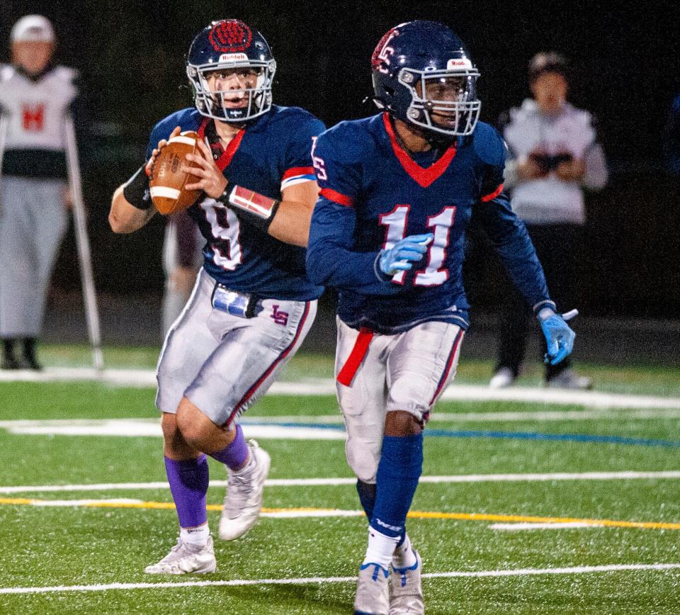 Lincoln-Sudbury Regional High School junior quarterback Cooper Tarantino looks to throw against Wayland, Oct. 21, 2022.
