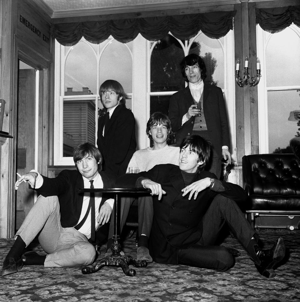 The Rolling Stones, (left to right), Charlie Watts, Brian Jones, Mick Jagger, Keith Richards and Bill Wyman (behind) seen in 1964. Source: PA Wire/AAP