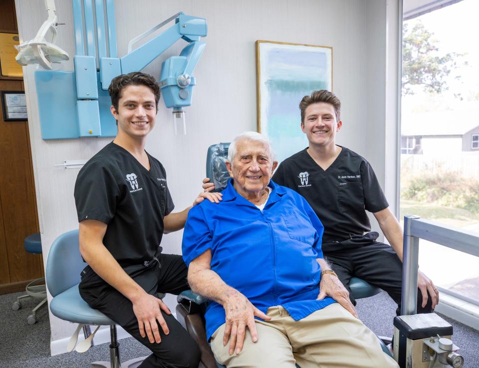 After a long career in Panama City, Dr. William G. Harrison is passing his dental practice on to his two grandsons, Drs. Benjamin, left, and Jacob Harrison.