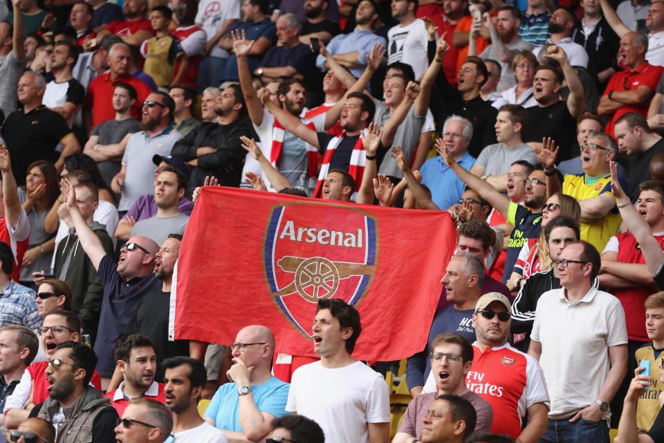 Arsenal fans at the Emirates Stadium: Getty Images