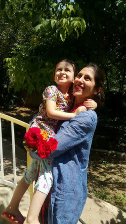 FILE PHOTO: Family handout photograph showing British-Iranian aid worker Nazanin Zaghari-Ratcliffe reunited with her daughter Gabriella after her temporary release from an Iranian jail, Tehran Iran, August 23, 2018. REUTERS/File Photo