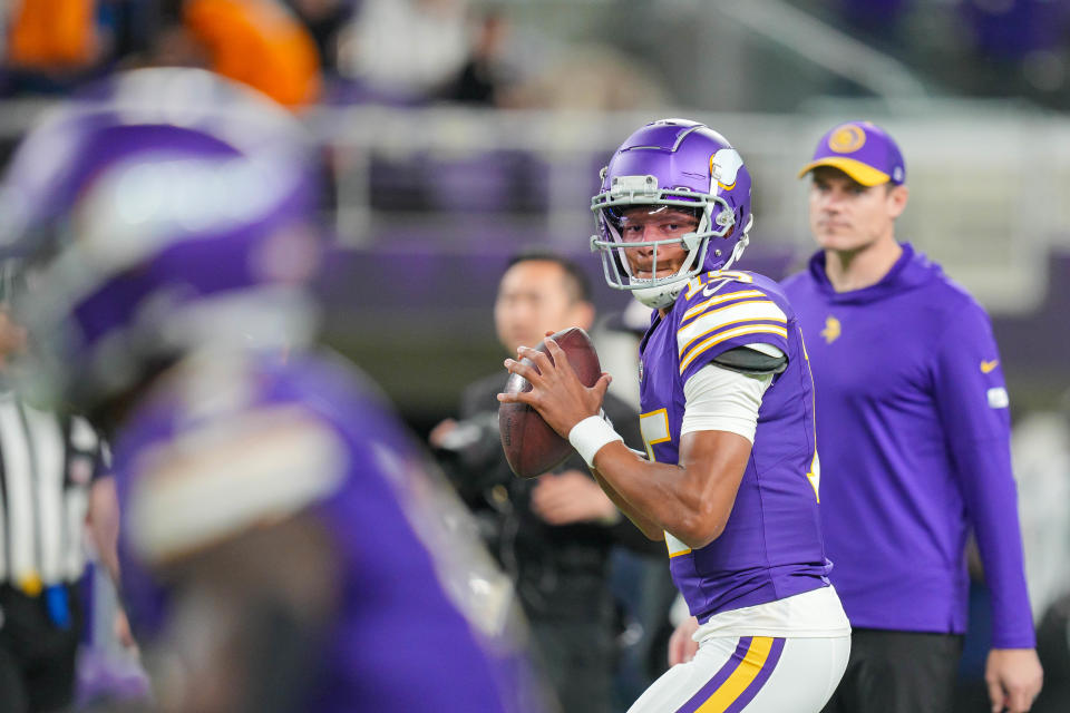 Vikings QB Joshua Dobbs warms up before the "Monday Night Football" game against the Bears.