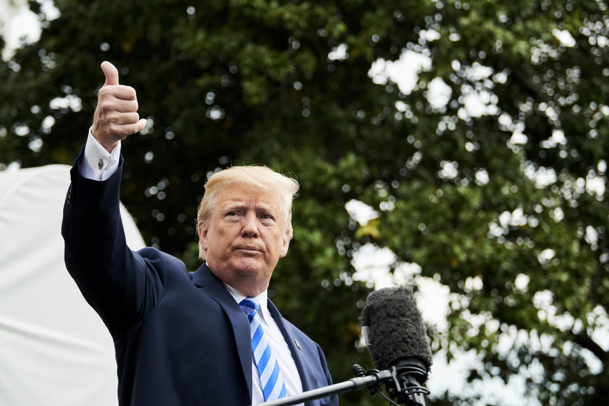 President Trump gives a thumbs-up. (Photo: T.J. Kirkpatrick/Bloomberg via Getty Images)