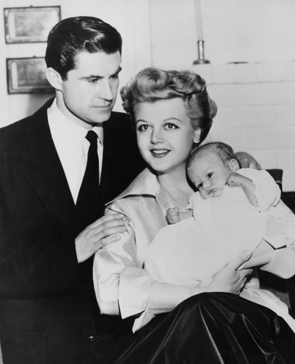 Actress Angela Lansbury with her husband, actor Peter Shaw (1918 - 2003) and their three-month-old son Anthony Peter at their home in Hollywood, California, 1952. (Photo by Keystone/Hulton Archive/Getty Images)