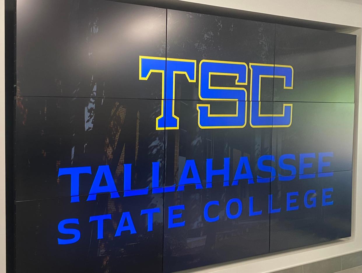 Tallahassee Community College's new TSC logo is displayed on a screen during the college's reception to celebrate the rebranding.