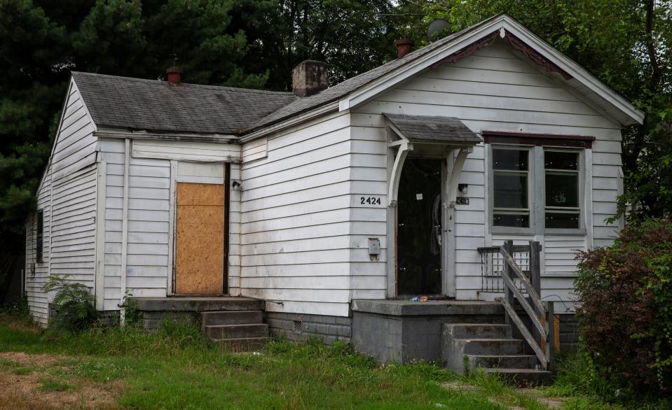 The house on Elliott Avenue in Louisville's Russell neighborhood, where Jamarcus Glover claims he was forced out by the city as part of a plan to gentrify the neighborhood. July 6, 2020