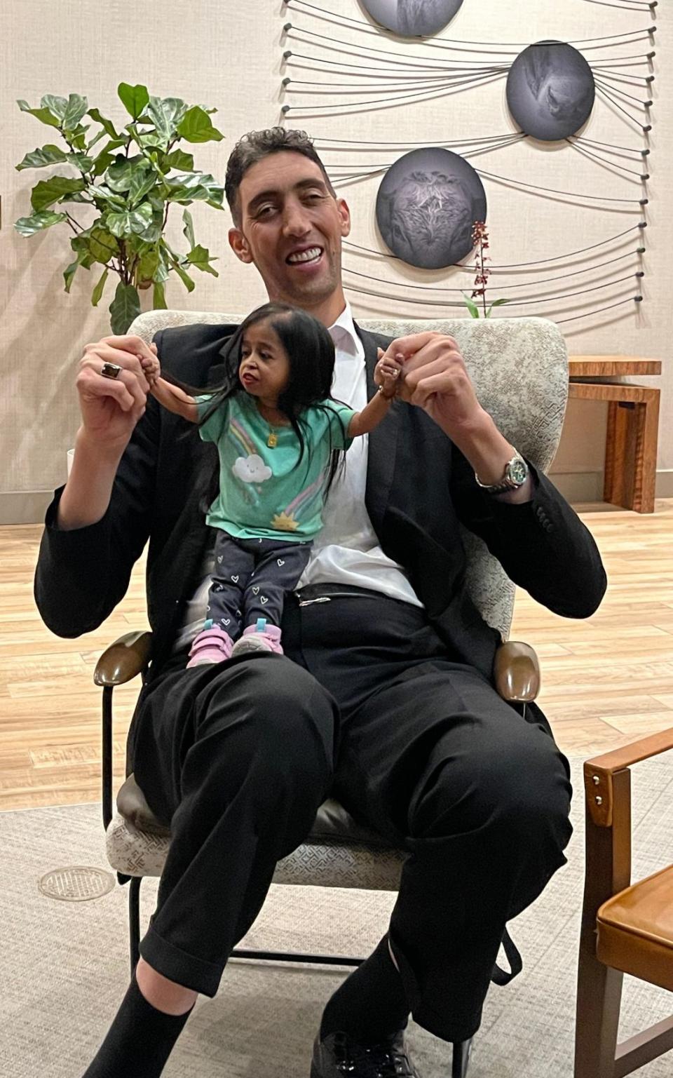 The tallest living man in the world Sultan Kosen, who stands at 251 cm (8 ft 2.82) meets Jyoti Amge