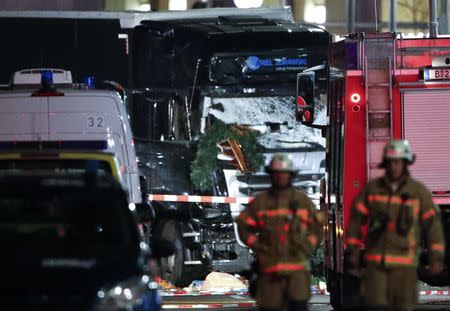 Parts of a Christmas market decoration stick in the windscreen of a truck following an accident with the truck on Breitscheidplatz square near the fashionable Kurfuerstendamm avenue in the west of Berlin, Germany, December 19, 2016. REUTERS/Fabrizio Bensch