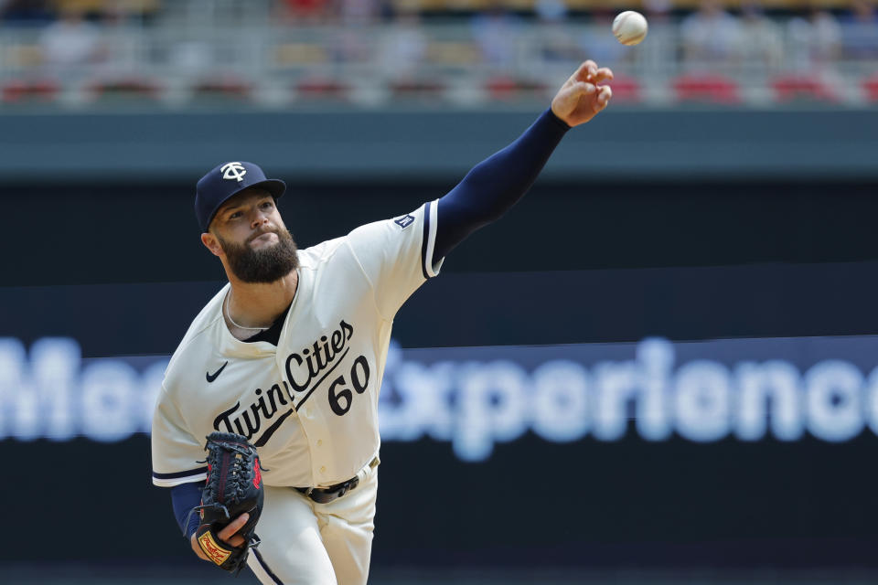 Minnesota Twins starting pitcher Dallas Keuchel throws to the Pittsburgh Pirates in the first inning of a baseball game Sunday, Aug. 20, 2023, in Minneapolis. (AP Photo/Bruce Kluckhohn)