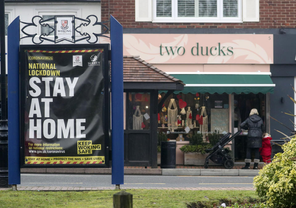 General view of signage at St John's near Woking, Surrey. Residents in a part of Surrey are to be urgently tested for Covid-19 after it emerged the South African strain of the virus may have started spreading in the community. Two positive cases of the strain - which has been worrying scientists - have been identified in people with no links to travel or previous contact with those affected. Picture date: Monday February 1, 2021.