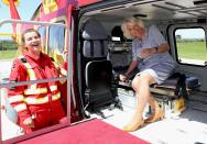 <p>Camilla, Duchess of Cornwall, smiles during a visit to the Cornwall Air Ambulance Trust in Newquay, England, on Monday to launch the new "Duchess of Cornwall" helicopter, marking her 10th year as patron of the organization. </p>