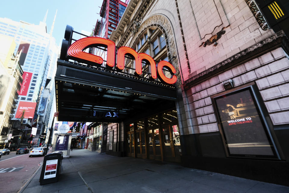 FILE - In this May 13, 2020 file photo, AMC Empire 25 theatre appears on 42nd Street in New York. Last weekend, theaters were cleared to open begin opening in some New York State counties at under 50% capacity and this weekend San Francisco will join in too. New York City and Los Angeles remain closed, however. AMC Theaters and Cinemark are largely up and running. Approximately 54% of screens are open in the U.S., according to the National Association of Theater Owners. (Photo by Evan Agostini/Invision/AP, File)