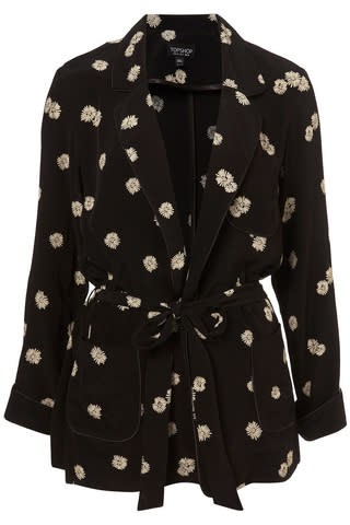 Black daisy print jacket, $110, at Topshop